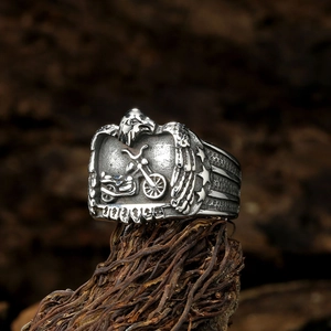 Retro stainless steel eagle motorcycle ring for men featuring detailed relief carving