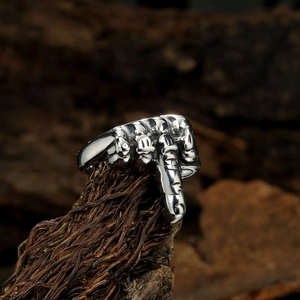 Retro stainless steel ring featuring a fist with middle finger and gothic engraving