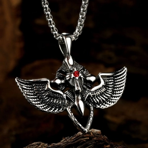 Silver Ankh cross necklace with devil wings and a red crystal stone pendant
