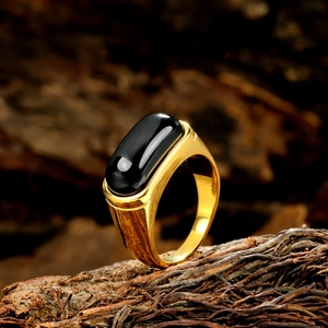 Vintage men's gold stainless steel ring with a large rectangular black gemstone inlay
