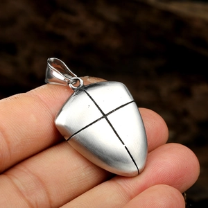 Silver cross shield pendant in brushed titanium steel with vintage punk design