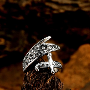 Vintage silver steel ring for men featuring a diamond-set sword and wing design