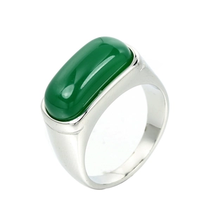 Vintage stainless steel ring with a large oval green gemstone and silver polished finish