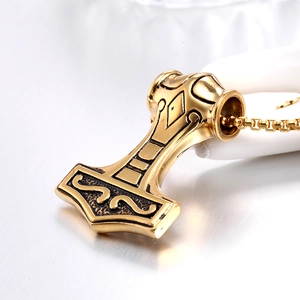 Polished gold Mjolnir pendant with Viking engravings on a square box chain necklace