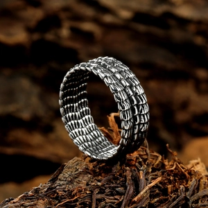 Vintage stainless steel ring with detailed dragon scale engraving and silver finish