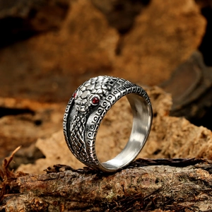 Vintage stainless steel snake ring with realistic scales and red stone eyes for men