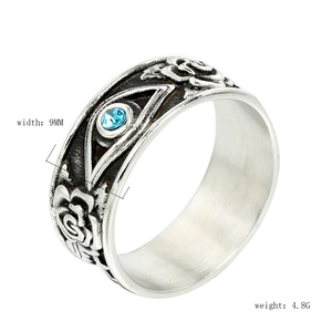 Gothic cross ring with evil eye and blue gemstone in vintage stainless steel style