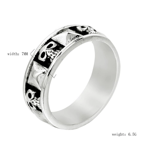 Retro silver cross anchor ring with skull relief and pyramid studs in punk style