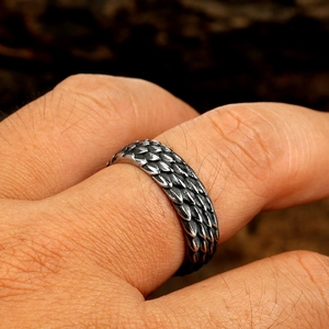 Vintage stainless steel thumb ring with textured dragon scale relief design