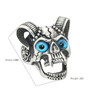 Gothic punk ram skull ring with blue eyes in vintage stainless steel finish