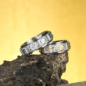 Vintage Yin Yang Tai Chi spinner ring with textured hammered stainless steel finish