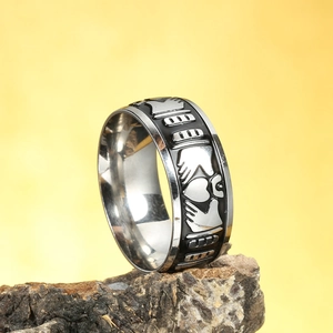 Vintage punk titanium steel Claddagh ring featuring hands holding a crowned heart