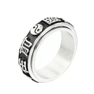 Retro spinning ring with Yin Yang Tai Chi symbols and Ping An engraving in silver