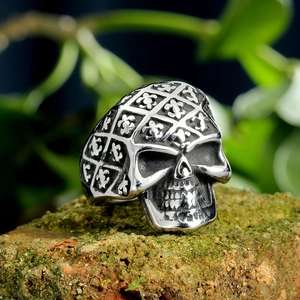 Retro stainless steel skull ring with diamond lattice texture and oxidized silver finish