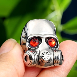 Vintage punk gas mask skull ring with red gemstone eyes in silver steel finish