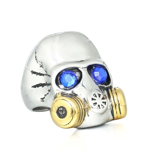 Punk skull gas mask ring with blue rhinestone eyes and vintage silver finish