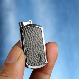 Men's rectangular hammered steel pendant with beveled edges and crystal accents