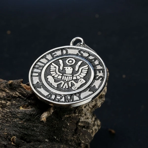 Macro shot of United States Army eagle emblem on embossed stainless steel pendant