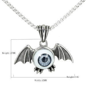 Gothic bat wing pendant necklace with a blue eyeball center and chunky metal chain