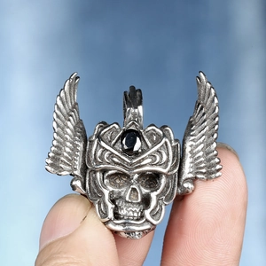 Vintage stainless steel eagle wing skull pendant with black gemstone for men