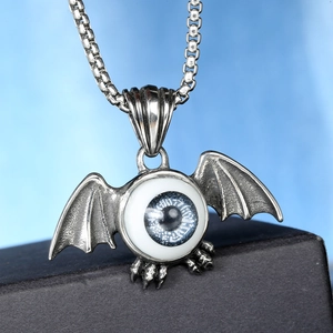 Gothic bat wing pendant with blue eye and vintage silver finish on chunky square chain