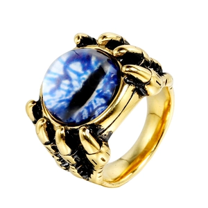 Punk style dragon claw ring with blue evil eye in gold stainless steel finish