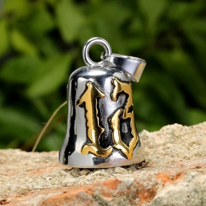Polished stainless steel bell pendant with golden number 13 on a brick background