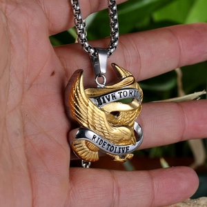Detail of eagle pendant with Live to Ride engraving on stainless steel chain