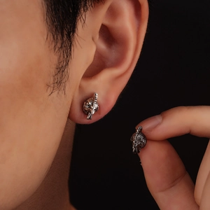 Vintage silver rooster head studs for men with realistic feather texture and dark finish