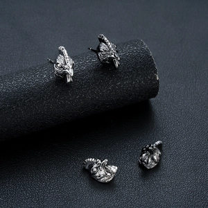 Vintage rooster zodiac stud earrings in matte silver with detailed feather textures