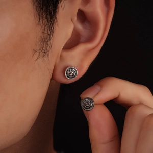 Retro silver lion head embossed magnetic stud earrings with minimalist round design