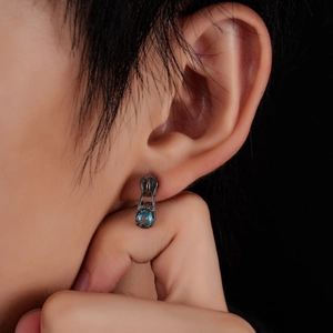 Boucle d'oreille créative en forme de zip avec zircon bleu et métal industriel