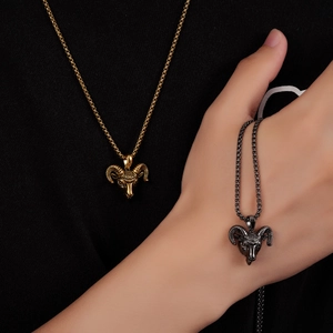 Fashionable goat head pendant necklace in gold and vintage black steel for women