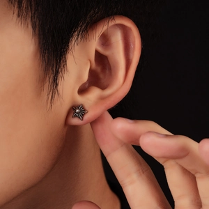 Vintage punk style stainless steel star earring for men featuring gothic retro textures