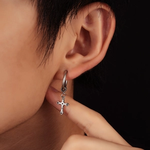Silver cross drop hoop earrings for men in vintage punk style, shown on model