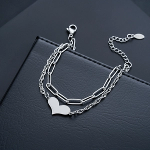 Minimalist double-layered silver heart bracelet in stainless steel with dual link chains