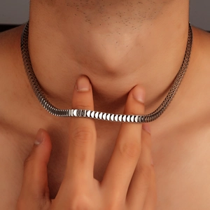 Titanium steel fish-scale chain necklace with polished silver finish on model