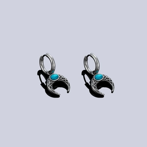 Bohemian crescent moon earrings with turquoise stone and Celtic knot pattern in silver finish