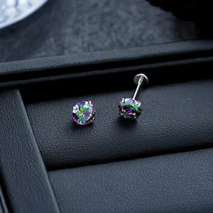 Close-up of four-prong rainbow zircon stud earrings with internal screw flat back design
