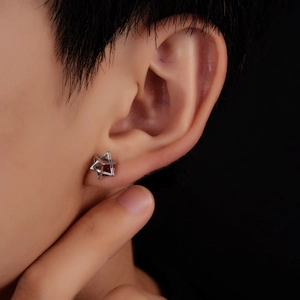 Stereo hexagram stud earring in silver with a round red zircon gemstone for men and women