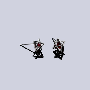 Modern hexagram stud earrings in silver with a round-cut red zircon center stone