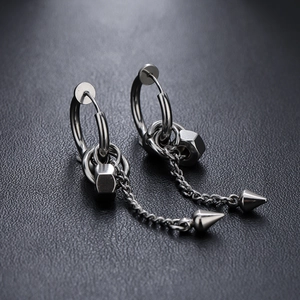 Industrial style titanium steel drop earrings featuring hexagon nuts and tapered metal cones