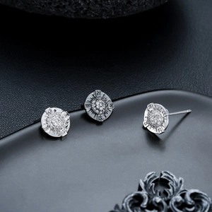 Compass silver stud earrings with sparkling cubic zirconia and engraved N S E W letters