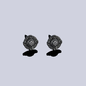 Black compass stud earrings for men with white zircon pavé and NESW engraving