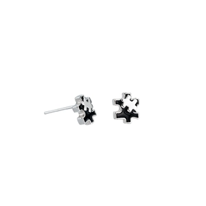Modern irregular puzzle piece stud earrings in silver metal and black enamel finish
