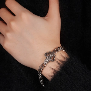 Vintage stainless steel Fleur-de-lis bracelet with a bold curb chain for men and women