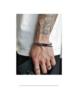 Detail of double-layer titanium steel chain bracelet and minimalist silver open rings