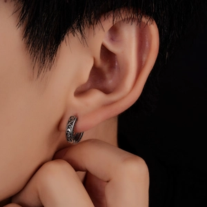 Vintage titanium steel hoop earrings with intricate retro floral patterns for men and women