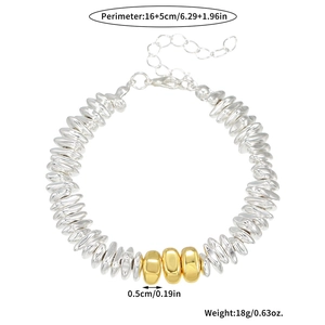 Detail view of silver and gold beaded bracelet with precise size and weight measurements