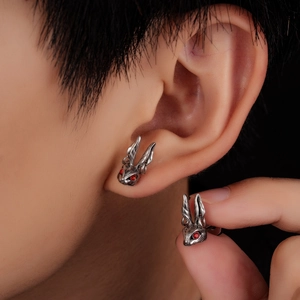 Punk style stainless steel rabbit stud earrings with red zircon eyes on ear
